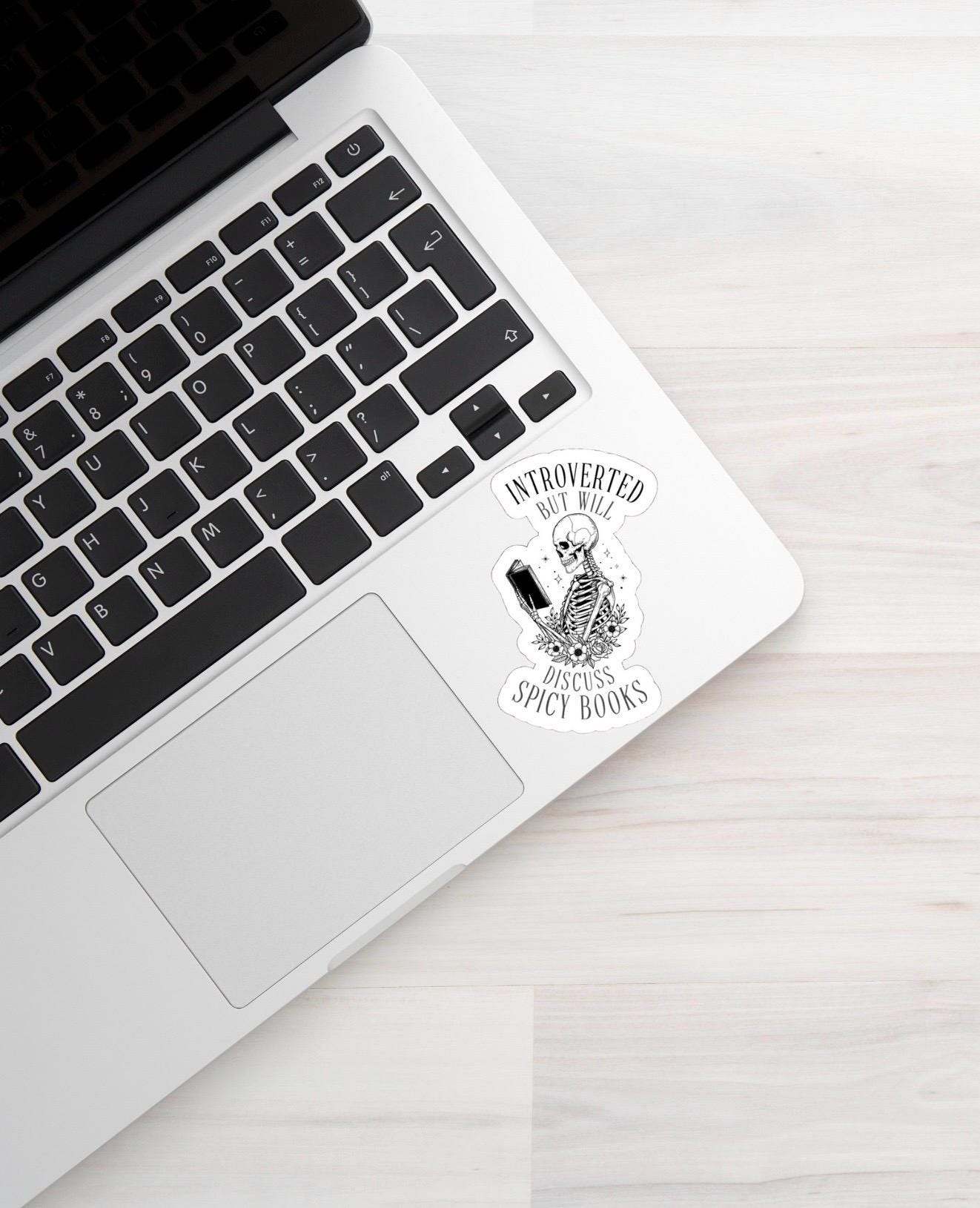 Introverted Spicy Book Sticker – Funny Skeleton Reading Decal for Laptop, Tumbler, Water Bottle • Water-Resistant Vinyl Sticker • Gift